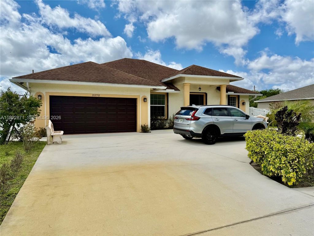Photo of 2272 SW Cameo Blvd, Port St Lucie, FL 34953 (MLS # A11992871)