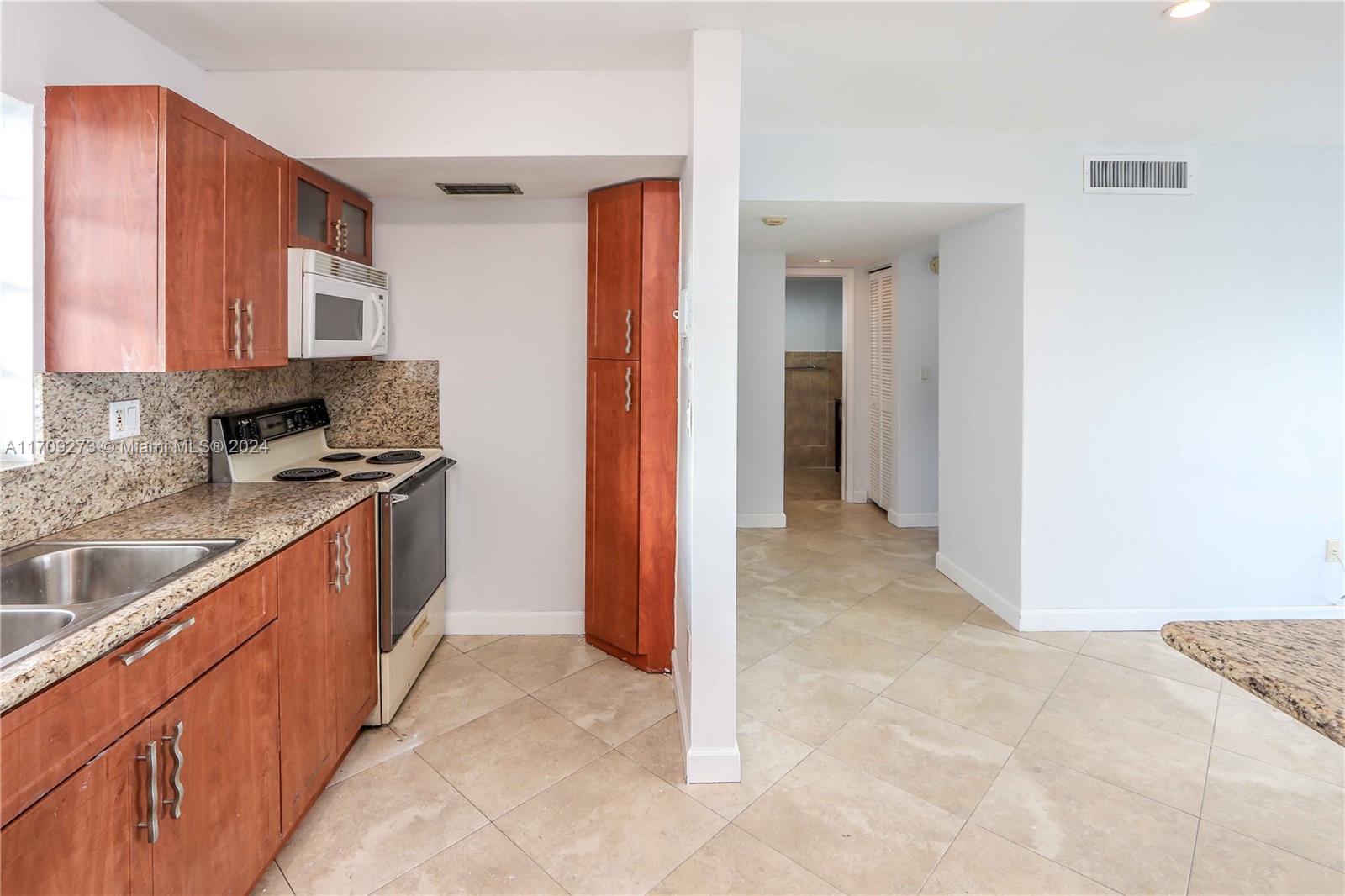 VILLAGE AT DADELAND CONDO - Residential
