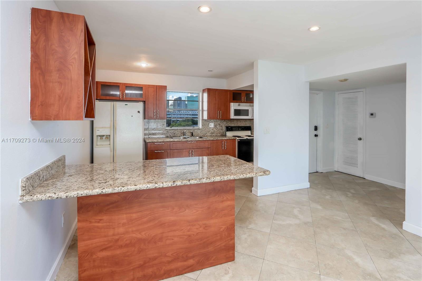 VILLAGE AT DADELAND CONDO - Residential