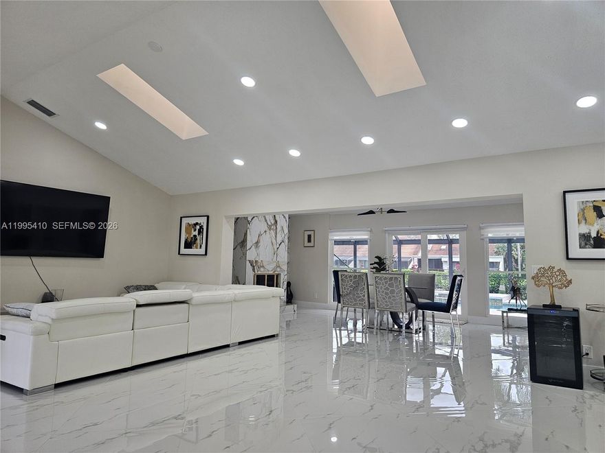 Single-story residence in PGA Nation no membership required.
Completely renovated 4-bedroom, 2-bath home with heated pool and spa, set on a quiet cul-de-sac.
A new tile roof September 2025, impact-rated windows and doors, and a refined, modern interior. Light-filled living spaces enhanced by skylights, quartz waterfall countertops, spa-quality bathrooms with dual showerheads, and a wood-burning fireplace.
The screened pool and patio create a private outdoor setting, complemented by updated equipment, new pool heater and  pumps refreshed landscaping, and a redesigned irrigation system. Positioned on a corner lot with open lake views.
A clean, well-designed home with a quiet sense of luxury.
Can sell with furniture or without.
Owner motivated.