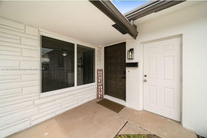 Spacious 2/2 (1,400 sq ft)unit in the highly desirable East Ft. Lauderdale neighborhood, is only a few minutes; drive from Lauderdale- by- the sea and nearby beaches. Also, located close to main thorough-fares makes it easy to get to shopping plazas, great restaurants, hospitals and Downtown Oakland Park with all the cool events and eateries they offer. This unit has a spacious laundry room with plenty of storage, tile floors throughout, covered patio looking out to a large fenced in backyard perfect for entertaining. The kitchen has been updated with Granite counters and nice cabinets, large and open feel. There is a circular driveway with plenty of parking space. Master bedroom has a newly renovated in suite bathroom and waterproof vinyl flooring.