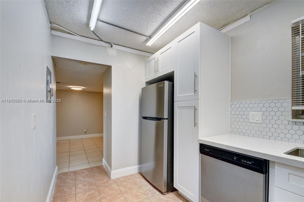 Photo of 114 Lake Anne Dr #114, West Palm Beach, FL 33411 (MLS # A11842600)
