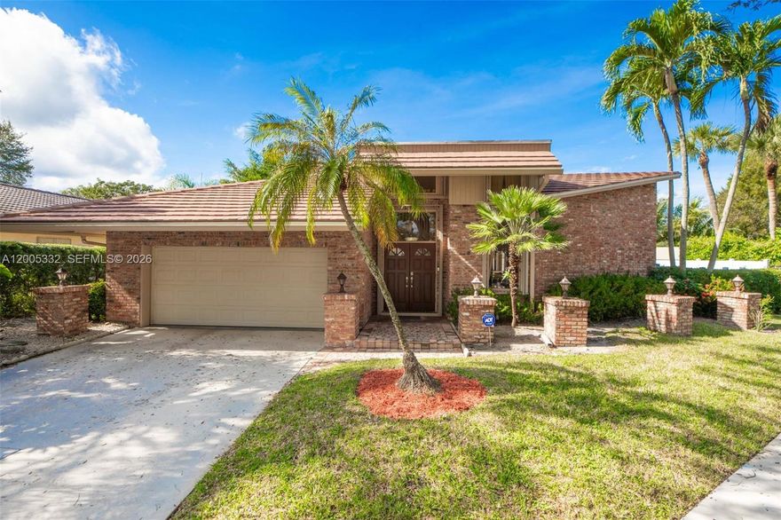 Experience elevated South Florida living in this stunning golf course home in the heart of Boca Raton. With 3,207 square feet, 4 bedrooms, and 3.5 baths, this residence blends spacious design with refined upgrades; soaring 20-foot vaulted ceilings create a dramatic first impression in the living and dining rooms, while walls of glass invite natural light throughout; the expansive 700 sq. ft. primary suite offers serene golf course views — your own private escape at the end of the day; step outside to a beautifully updated pool featuring Diamond Brite resurfacing and new tile (2021), perfect for entertaining or relaxing in total privacy, enhanced by a new hurricane-rated fence (2019); additional highlights include: complete hurricane protection, solid wood cabinetry in kitchen and baths, new roof (2018), exquisite gated community with low HOA, 5 minute drive to Town Center Mall and Sugar Sand Park, easy access to I-95, walking distance to houses of worship; a rare opportunity to own a golf course property with major upgrades already completed; the golf course, Via Mizner, has been completely re-done over the past few years; Whispering Woods is a part of the Great Boca Raton Beach & Parks District offering their residents access to the Boca Raton beaches etc.