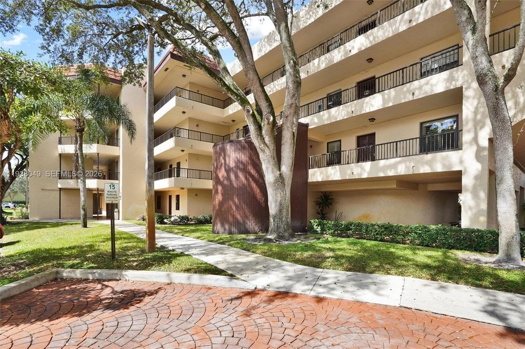 Photo of 10401 W Broward Blvd #205, Plantation, FL 33324 (MLS # A11938049)