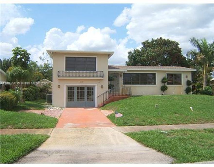 Lovely remodeled 4 bedroom, 3 bath, single family home located only one block from Lake Osborne. Upstairs family room, kitchen, and outside deck have views of the gorgeous lake Osborne. Vinyl flooring and Granite flooring throughout. Main level has living room, dining room, kitchen, family room and master bedroom; up a few granite stairs, main bath with two more bedrooms. Downstairs could be large family room or 4th bedroom with full bathroom with its own front entrance. Also, great for entertaining with built in bar. Pets welcome with fenced yard and two large sheds for storage. No HOA, move in quick. Beautiful home, will go quick !