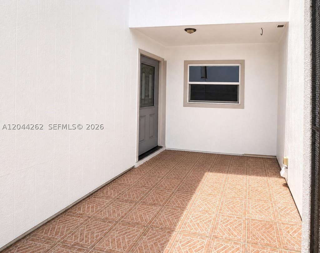 Photo of 7022 Edgemere Ter, Palm Beach Gardens, FL 33410 (MLS # A12044262)