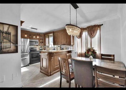 Photo of 985 NE 33rd Ter #201, Homestead, FL 33033 (MLS # A11919315)