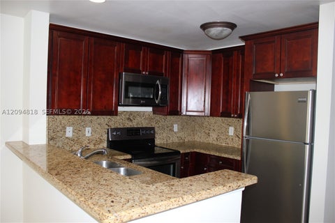 Photo of 4871 Via Palm Lks #703, West Palm Beach, FL 33417 (MLS # A12094818)