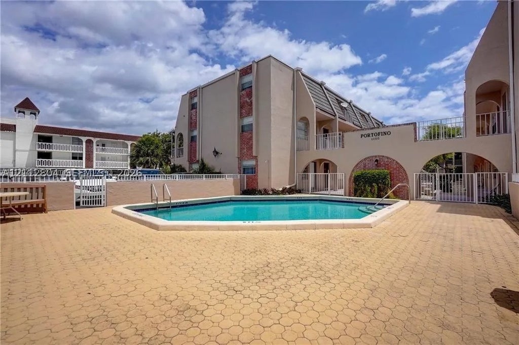 Photo of 1100 SE 4th Ave #30, Deerfield Beach, FL 33441 (MLS # A12112804)