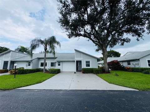 Photo of 8957 Meadowlark Way, Boca Raton, FL 33496 (MLS # A11876156)