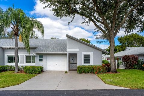 Photo of 8957 Meadowlark Way, Boca Raton, FL 33496 (MLS # A11876156)