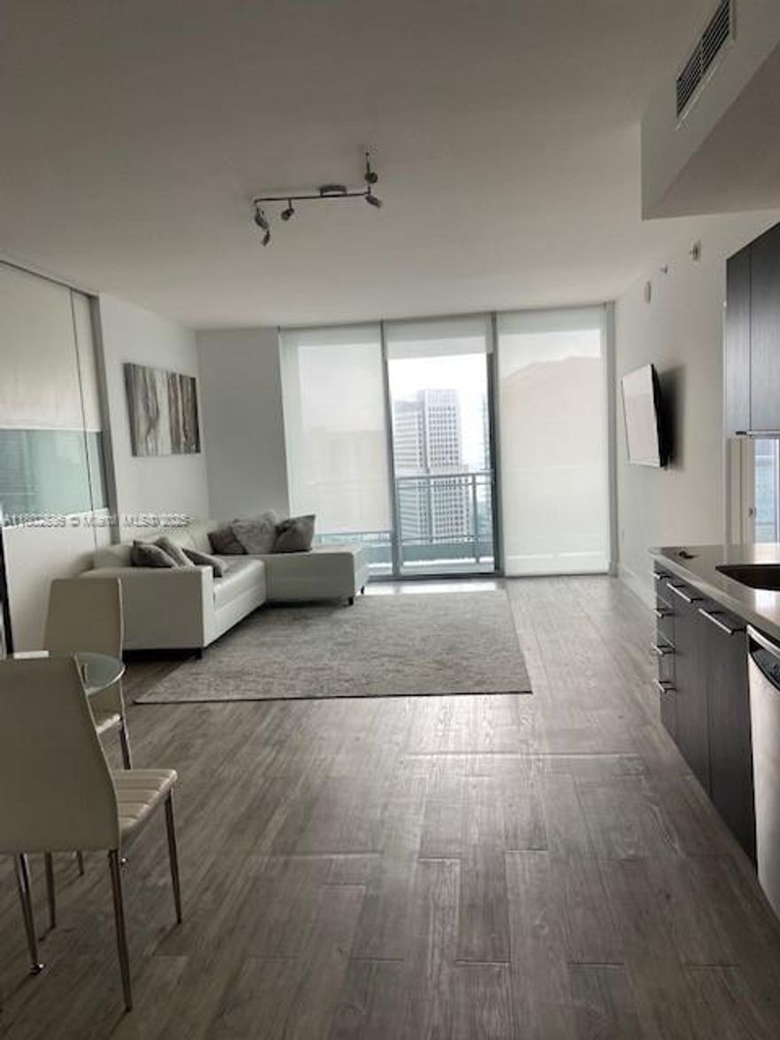 The IVY Condo is located in the Miami River District in the gated community Riverfront soon to be The Faena District Miami River that will span three blocks and include curated cultural spaced, wellness facilities, public art, and recreational areas - elevating the area and enticing Downtown Miami's cultural fabric. This property is full of natural light overlooking the Bay, River and Brickell SkyLine. The IVY Condo just finished renovations including the lobby, pool and spa/sauna area.