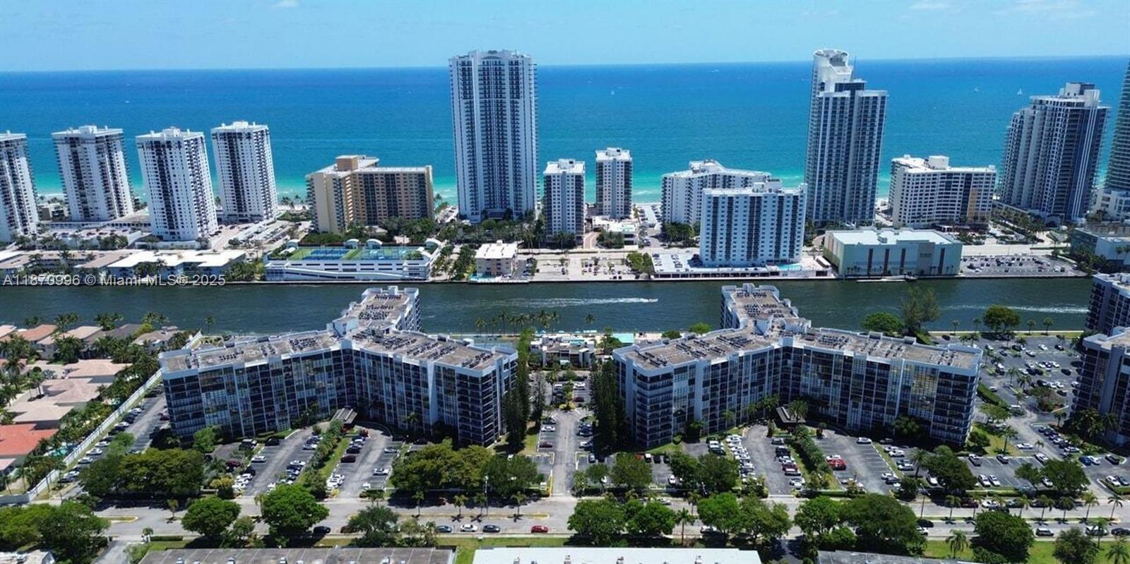 Spacious convertible unit with a lot of natural light. One bedroom plus den which could be used as second bedroom or office space. Perfect location, desirable Three Islands Community. Close to stores, restaurants and ocean. Amenities include tennis courts, heated pool with intercostal views, secured lobby, gym and extra storage.