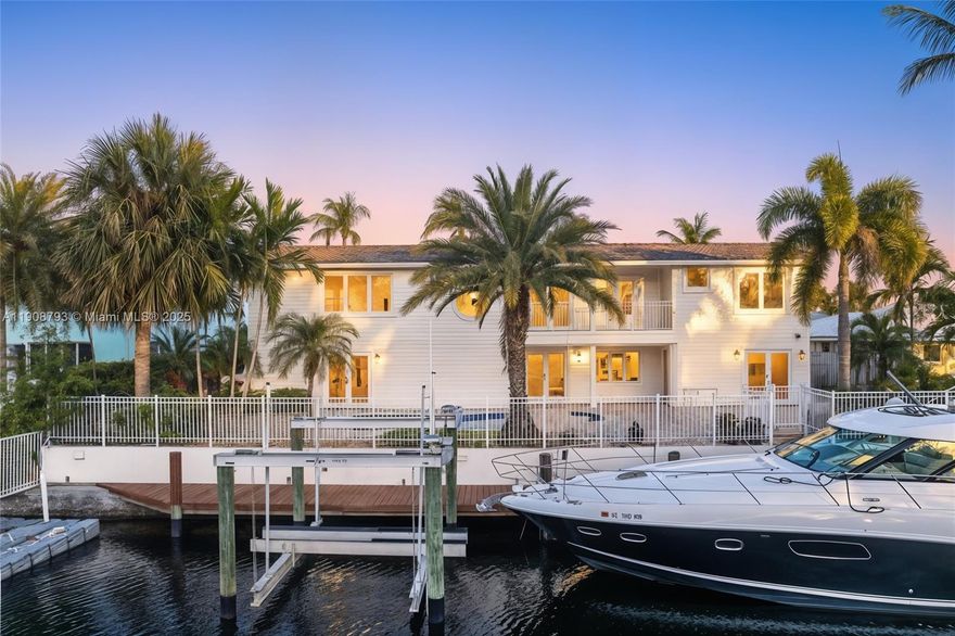 A refined waterfront estate in Lighthouse Point’s Venetian Isles. Positioned along a wide canal with generous frontage and no fixed bridges, this residence offers easy access to the Hillsboro Inlet. Open living & dining areas connect beautifully with the kitchen, filled with natural light & elegant finishes that create a warm, inviting flow. A glass-enclosed lounge adds architectural sophistication, while the primary suite provides privacy with a spa-like bath & boutique closets. The upper level features ample guest suites & a loft retreat overlooking the pool and canal—an ideal space for relaxation & quiet gatherings. Designed for those who value connection, the backyard’s resort-style pool & private dock offer the perfect setting for family, boating, & lasting memories by the water.