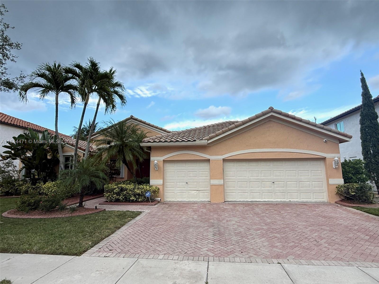 Welcome to this spacious and elegant 4 bedroom, 3 bath home with a dedicated office, located in the highly sought after guard-gated community of Windsor Palms in West Miramar. Boasting 3,760 sq ft of living space, this beautifully maintained residence features a 3-car garage, a backup generator for peace of mind, and a serene lake view that adds to its charm and tranquility. Enjoy an open and functional layout perfect for both entertaining and everyday living. The private office offers the ideal space for working from home, while the generous bedrooms provide comfort and flexibility for the whole family. This rare gem combines space, functionality, and location and is just minutes from top rated schools, shopping and major highways. It's just waiting for you to call it home..