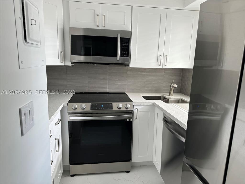 Photo of 1333 E Hallandale Beach Blvd #423, Hallandale Beach, FL 33009 (MLS # A12066985)