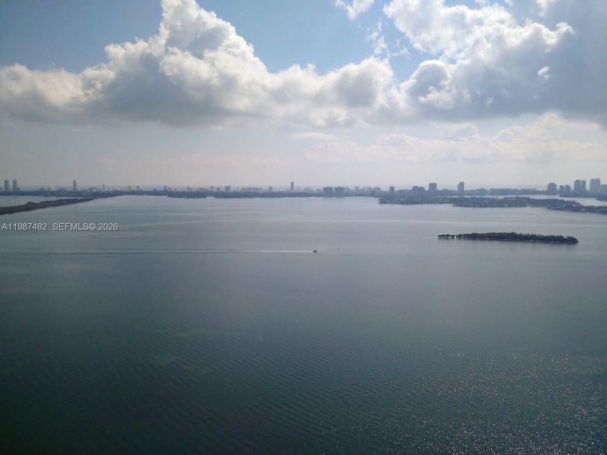 Wonderful unit in the most beautiful building in Edgewater. Building amenities include gym, massage room, 2 tennis courts, party room, cinema and much more. Unit has beautiful contemporary grey floors wood effect inside and outside. Also it has complete and beautiful closets in both bedrooms and window treatments with blinds. Incredible view of the bay, Miami beach, the ocean and the port of Miami, venetian islands and south beach. Don t miss it. See broker remarks for showings.