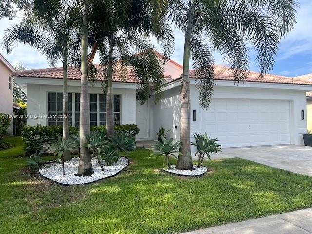 Stunning lakefront home for rent in the desirable SilverLakes community of Pembroke Pines! This updated 3-bedroom, 2-bath residence offers a bright open layout w/ wood-look tile floors, vaulted ceilings & recessed lighting. The modern kitchen features stainless steel appliances, granite counters, and cabinets, opening to the family room with serene lake views. The primary suite includes vaulted ceilings, a custom walk-in closet, and a spa bath with dual vanities and frameless glass shower. Two bedrooms share an updated bath with modern finishes. Step outside to your private backyard with patio seating under mature trees. Perfect for relaxing or entertaining by the water. Conveniently near A-rated schools, shopping, dining, parks & highways. Stylish, move-in ready, and designed for comfort!