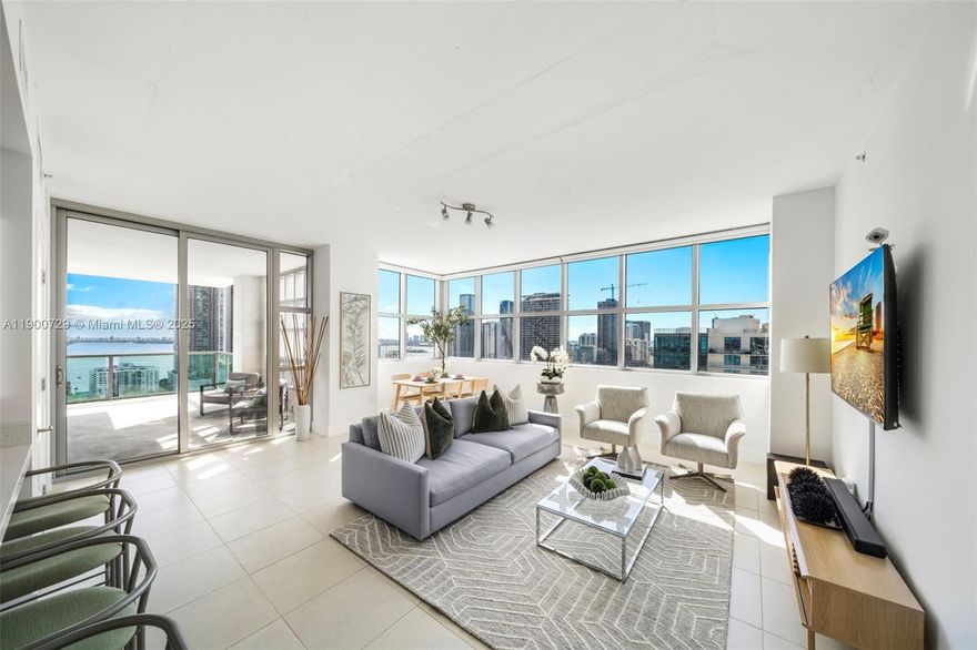 Impeccably renovated '12 line residence now available at Four Midtown. This expansive corner unit is the building's most coveted line, offering a spacious split floor plan, wrap-around balcony and views of the Miami Skyline and Biscayne Bay. New kitchen with waterfall countertop, stylish two-tone cabinets, farm sink and new appliances. Reconfigured primary suite offers an expanded custom closet that isn't standard on this floor plan. One of the most beloved elements of the '12 line is the balcony, which provides a wide covered section that acts as an indoor/outdoor retreat. Four Midtown was recently renovated with a new gym, pool and BBQ area. 24-hr security. Assigned parking. W/D in unit. Offered partially furnished with several designer pieces. Easy to show.