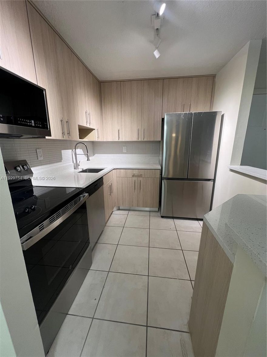 Remodeled Spacious 3BR/2BA new closets, new baths, new paint, new kitchen and much more condo in the desirable Doral Park Country Club Villas. Resort-Style Living in the Heart of Doral. Light-filled & move-in ready, this 3-BR, 2-BA retreat in Doral Park Open layout and private balcony perfect for relaxing or entertaining, plus in-unit washer/dryer for total convenience. includes exclusive membership to Doral Park Country Club, tennis, pickleball fitness center, resort-style pools, restaurant, and more. Ideally located minutes from Downtown Doral, City Place, top schools, shopping, dining, Miami International Airport, Great Schools. Gated community with 24/7 security