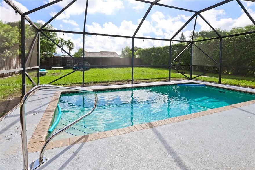 NEW IMPROVED PRICE, DON'T WAIT! Beautiful 1story single-family pool home,3 bdrms, 2 baths, w/dedicated office space in nice neighborhood of Boca Trace, top-rated schools, low HOA. Comfort, style, & convenience. Bright/open layout w/white porcelain tile & laminate floors throughout! Modern kitchen w/S-steel appl, granite counters,backsplash, cozy breakfast area. Sliding doors provide natural light throughout living areas.Large master ste, walk-in closet,pool view, updated en-suite bath,walk-in shower.Indoor-outdoor living w/screened-in salt water, heated pool overlooking the expansive fully fenced bckyrd. A/C (approx 5y/o),water heater (approx 1y/o), W&D, 1 car gge. Indoor patio can be set up as a garden or for storage. Great location near the Turnpike,shopping,dining, & top-rated schools.
