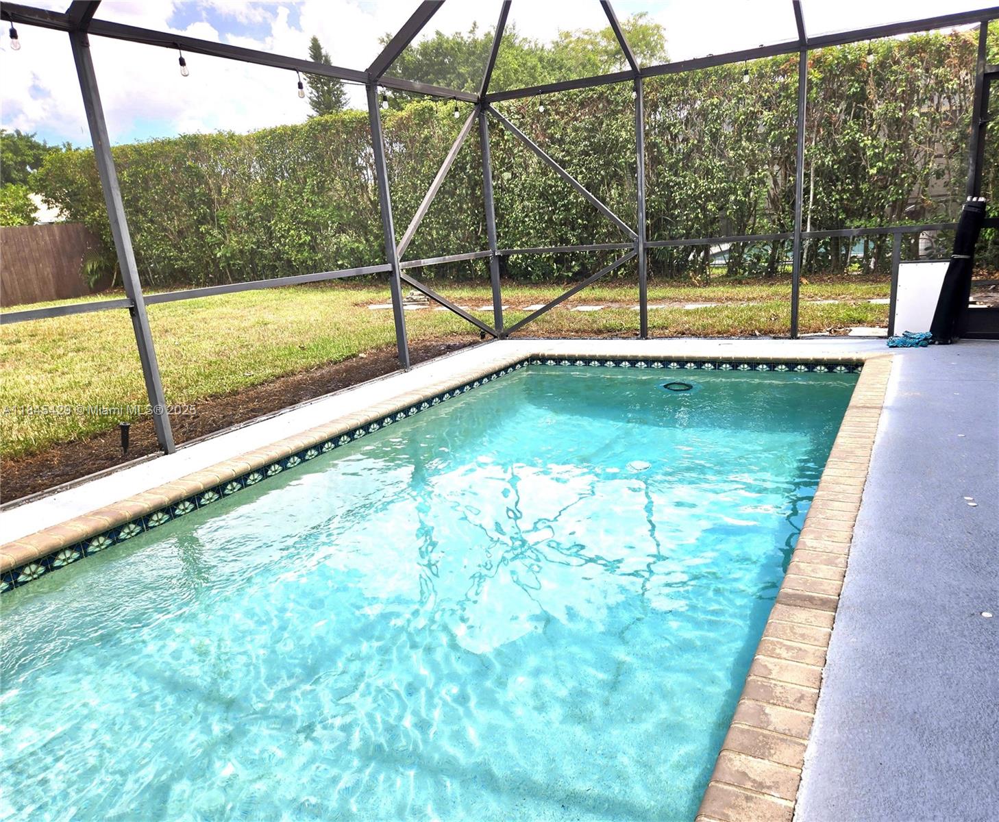 This is a great price, don't wait! Beautiful 1story single-family pool home,3 bdrms, 2 baths, w/dedicated office space in nice neighborhood of Boca Trace, top-rated schools,low HOA. Comfort, style, & convenience. Bright/open layout w/white porcelain tile & laminate floors throughout! Modern kitchen w/S-steel appl, granite counters,backsplash, cozy breakfast area. Sliding doors provide natural light throughout living areas.Large master ste, walk-in closet,pool view,updated en-suite bath,walk-in shower.Indoor-outdoor living w/screened-in salt water, heated pool overlooking the expansive fully fenced bckyrd. A/C (approx 5y/o),water heater (approx 1y/o), W&D, 1 car gge. Indoor patio can be set up as a garden or for storage.Great location near the Turnpike,shopping,dining, & top-rated schools.