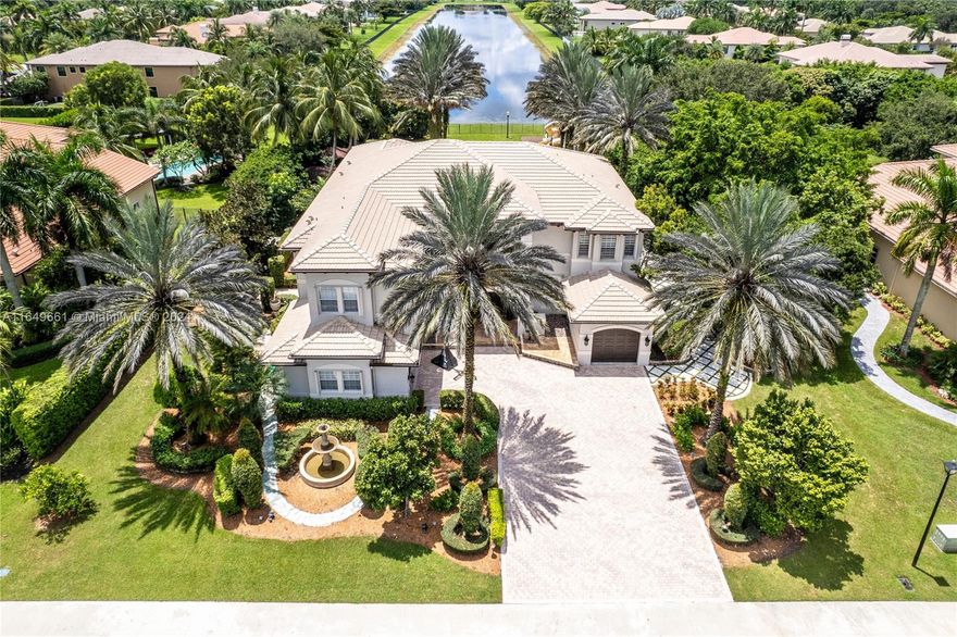 Premier Lakefront Home - 6 bedrooms, 5.5 bathrooms, 6910 SF Total, "Van Gogh" model- Long Lake Ranches West.  35,000+ SF lot, w/infinity-edge pool, outdoor kitchen & bar, loft/bonus/game room, and a 3+ car garage.  Travertine & wood flooring, 24-ft vaulted ceilings, accordion-hurricane shutters. Gourmet kitchen, stainless steel appliances, walk-in butler's pantry, and a wine room. The large primary bedroom has office/bonus room. Downstairs bedroom, ideal for guests or multi-generational living. The outdoor pool, bar, and grounds are equally impressive. Fully fenced and landscaped, offering both privacy and security. 24-hour gated & manned security, clubhouse, lighted basketball & tennis courts & play area.