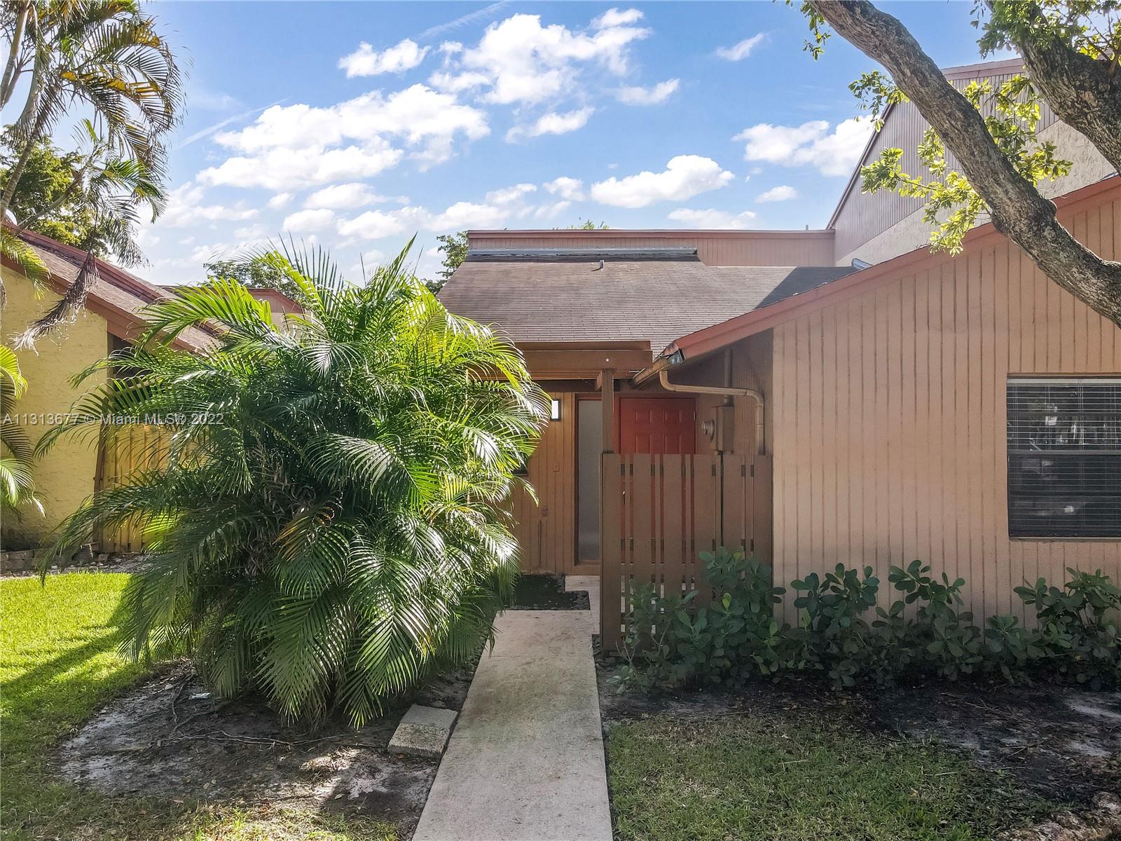 Completely remodeled, turn-key, corner unit at Villas of Plantation. Family room can easily be converted to a 3rd bdrm. Exterior is being repainted in January '23. Unit features high-end upgrades including solid wood cabinetry w/ brushed gold finishes, quartz counters, deep stainless steel sink, brand-new appliances, new floors. Totally upgraded bathrooms w/ custom solid wood cabinetry, quartz counters & frameless shower doors. Living room & primary bedroom features vaulted ceilings w/ exposed wood. Brand new washer/dryer in separate laundry room, completely private fenced yard for children, pets & privacy. Centrally located near major roadways, highways, shopping, & airport. The unit boasts vaulted ceilings & great natural light. Roof replaced in 2014, tented in 2020, AC replaced in 2019.