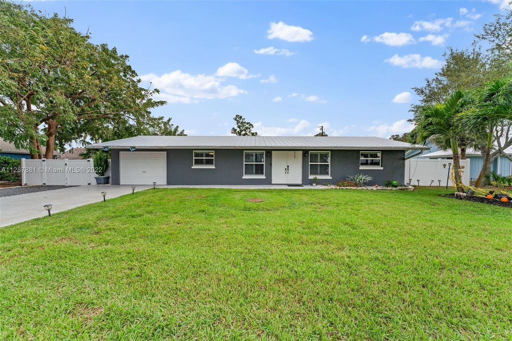 Photo of 757 SW Hidden River Ave, Palm City, FL 34990 (MLS # A11287881)