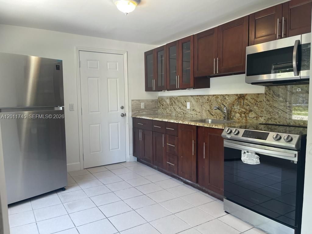 Photo of 5800 Taylor St #1, Hollywood, FL 33021 (MLS # A12011745)