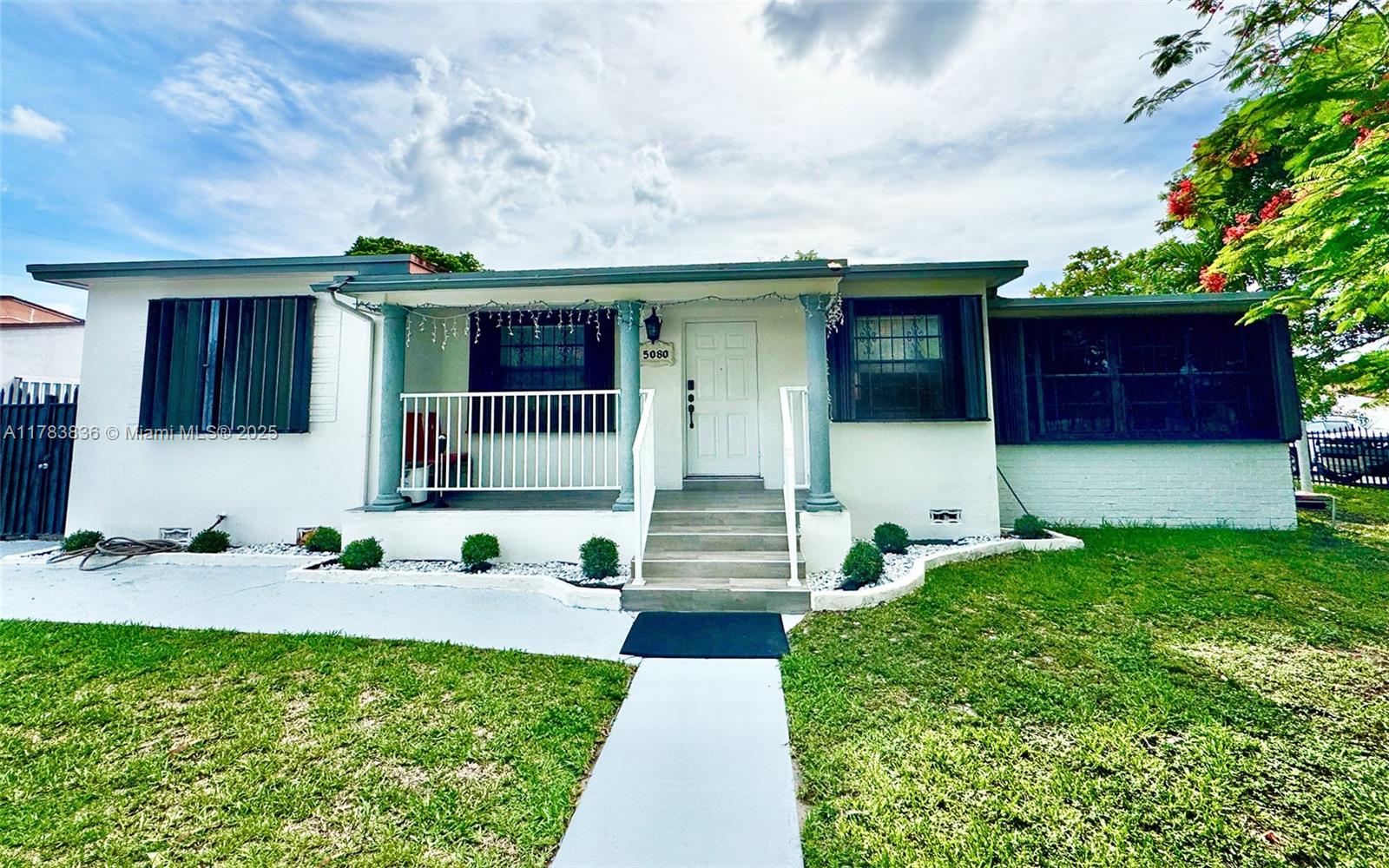 Spacious Duplex-Style 5 bed/2 bath one-story home on a huge corner lot! The house is perfect as a primary residence or Investment Property with great income potential. Main house has 3-bedroom, 1-bathroom with attached 2-bedroom, 1-bathroom in-law studio with its separate entrance. Open concept living & dining room, modern kitchen and laundry room. The property is fully fenced with cemented parking, carport, Accordion shutters and room to park an RV or boat. Centrally located in Hialeah close to major highways, Le Jeune Rd and 49th Street. Best of all, No HOA!