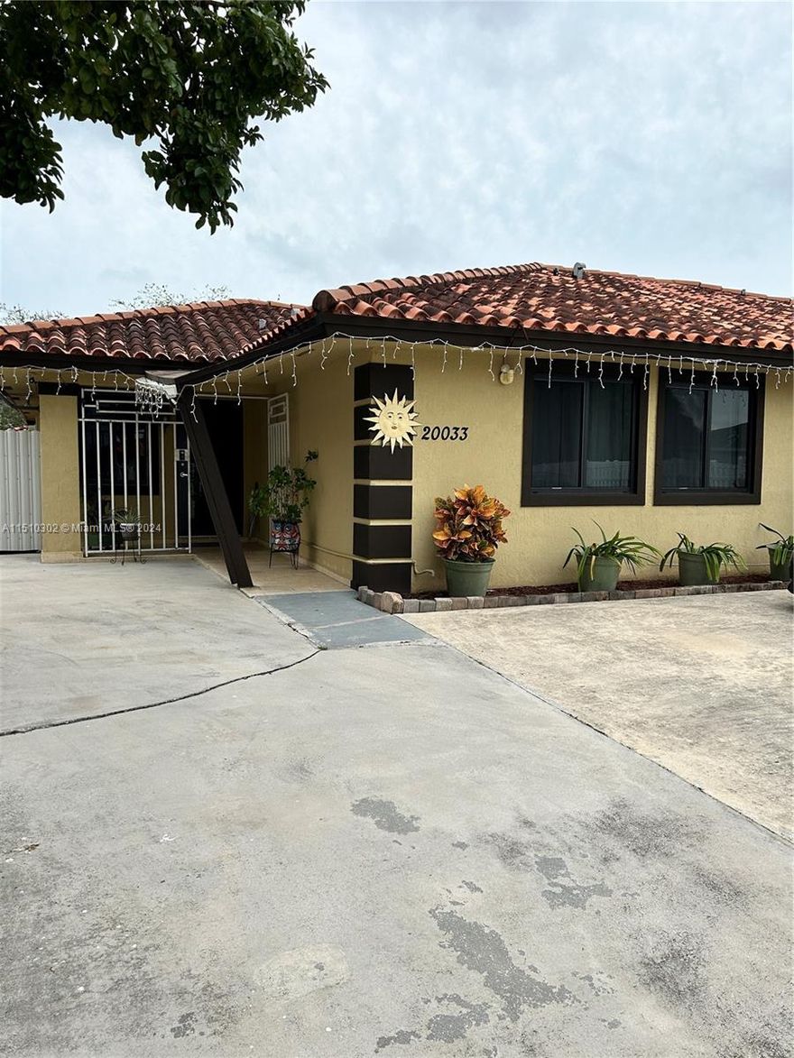 Beautiful 3 bed 2 bath twin home with an open concept connecting the kitchen, dinning and living room.  This home boasts spacious bedrooms, high ceilings, impact doors and windows, covered terrace with ample extra patio space and a great size storage room with its own independent AC unit. Property is gated and has security cameras throughout the entire house. Home also offers Guanabana and Avocado trees to enjoy. Great location close to the turnpike, supermarkets and more!