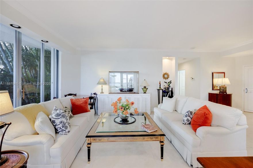 LOCATION, LOCATION, LOCATION! THIS UNIT IS UNIQUE!  FIRST FLOOR CORNER UNIT RIGHT ON THE INTERCOASTAL WITH VIEWS THAT ARE SIMILAR TO LIVING ON A CRUISE SHIP. HUGE, WRAP AROUND, EXTENDED LANAI TERRACE , COMPLETELY HEDGED FOR PRIVACY . THERE IS ALSO A PRIVATE ENTRANCE TO THE POOL, LIKE YOUR OWN!  THE COMBINATION OF ALL THE GLASS DOORS AND HIGH CEILINGS OF A FIRST FLOOR UNIT GIVE THE LIVING AREA AN OPEN AND SPACIOUS FEEL.  THE KITCHEN HAS BEEN UPDATED AND IS OPEN TO THE DINING RM. 3 BEDROOMS, 2.5 BATHROOMS AND LAUNDRY ROOM ROUND OUT THIS SPECIAL UNIT.  THE BUILDING IS ELEGANT WITH CONCIERGE, VALET AND FITNESS CENTER.  MYSTIC POINTE ALSO HAS TENNIS, PICKLEBALL,  MARINA, PLAYGROUND, SHOPS, SALON AND DINING.  WALK  TO HOUSES OF WORSHIP, THE TURNBERRY CIRCLE AND WORLD FAMOUS AVENTURA MALL.
