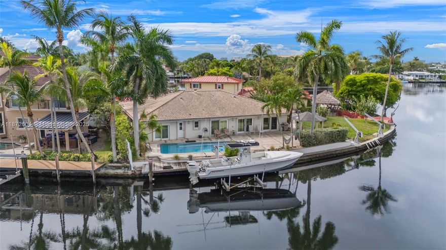 Welcome to 2401 Fryer Point, a rare point lot offering sweeping, panoramic views of the Middle River in Fort Lauderdale’s prestigious Coral Ridge neighborhood. With its enviable location and expansive waterfront exposure, this property is an exceptional canvas for a visionary buyer.
The residence features impact windows and doors, a boat lift, open design, and one of the best locations in the city. Whether you choose to renovate and elevate the existing home or design a brand-new luxury estate, this address delivers unmatched potential.
Located in the coveted Bayview Elementary school district, the property combines lifestyle and long-term value. From your private dock, enjoy ocean access and take in the breathtaking wide-water views that only a true point property can provide.