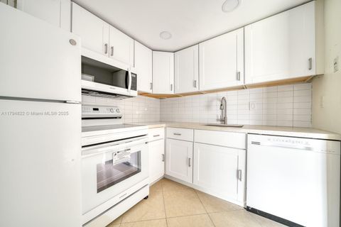 496 NW 165th St Rd D-316 Miami FL 33169