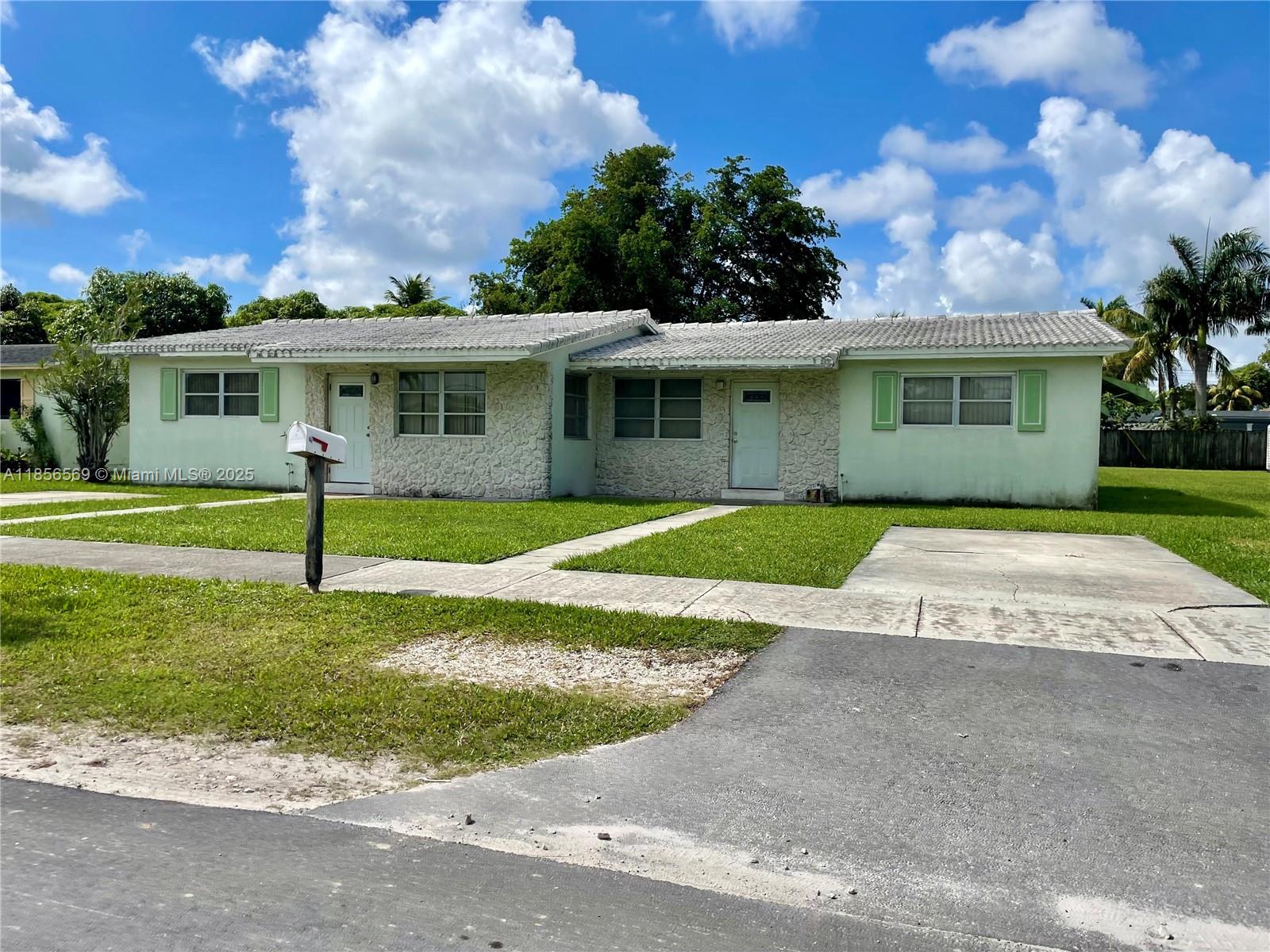 Duplex in North Miami Beach near the Golden Glades interchange, set on a large 10,580 sq ft lot with 1,753 sq ft of interior space and a durable barrel tile roof. Each unit is a 2 bed/1 bath; one unit is vacant and easy to show. Located on a quiet street, with nearby new construction underscoring the area’s rising value. Great opportunity for rental income, redevelopment, or multigenerational living in a prime, convenient location.