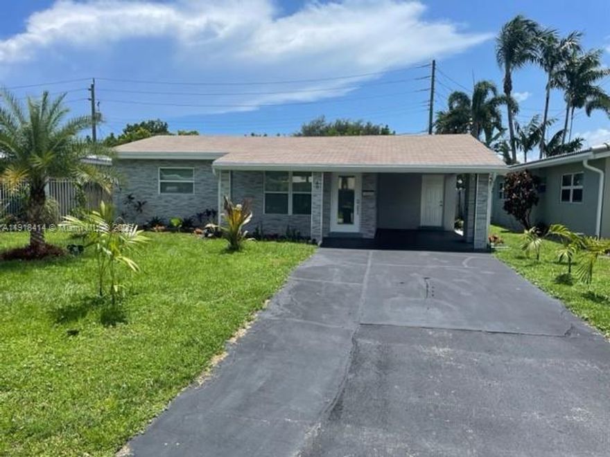 Beautifully remodeled 2BR/1BA single-family home located just minutes from the beach in East Fort Lauderdale. This upgraded residence features impact windows, tiled floors throughout, a spacious upgraded kitchen featuring quartz counters, upgraded cabinets, and stainless steel appliances. Large family areas perfect for comfortable living. Enjoy a huge private yard with multiple fruit trees, ideal for relaxing outdoors. Home includes in-unit washer/dryer. Conveniently situated east of I-95 and close to the Inter Miami Soccer Stadium, shopping, dining, and major highways. A bright, clean, move-in-ready home in a highly desirable area. Rent price may be negotiable.