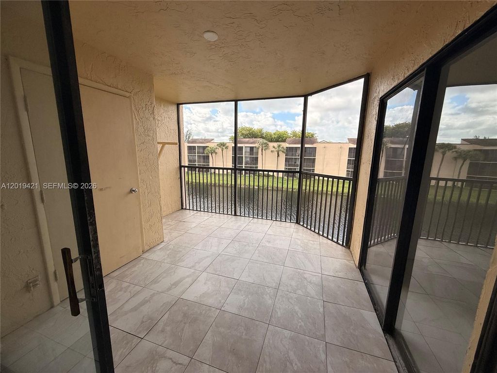 Photo of 3199 Foxcroft Rd #311, Miramar, FL 33025 (MLS # A12019421)