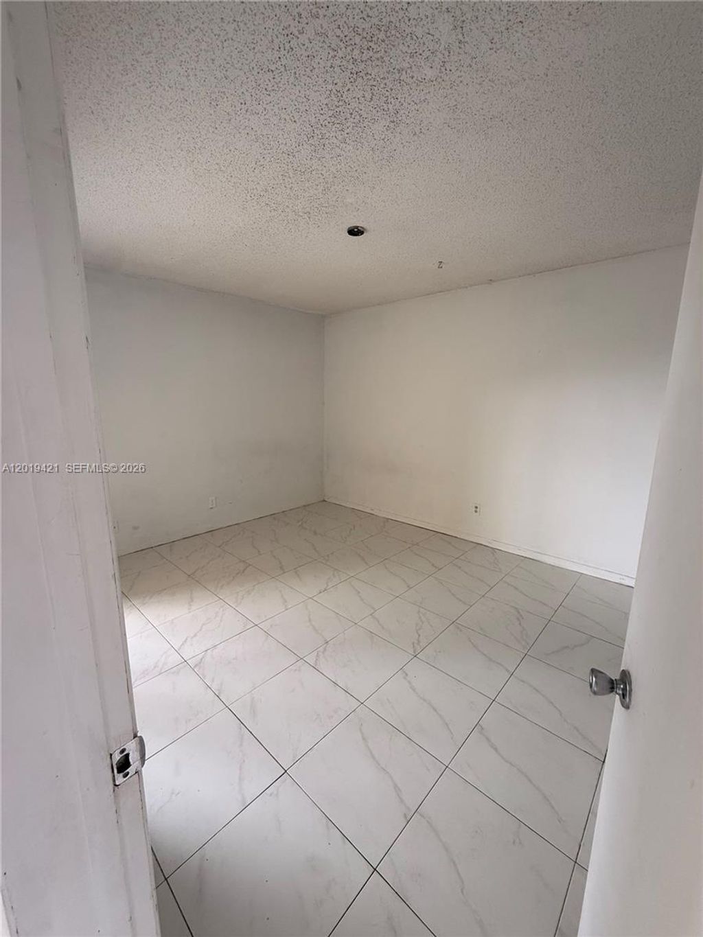 Photo of 3199 Foxcroft Rd #311, Miramar, FL 33025 (MLS # A12019421)