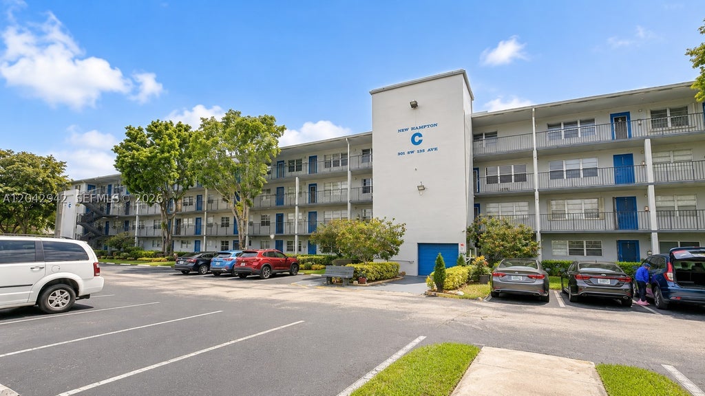 Photo of 301 SW 135th Ave #317C, Pembroke Pines, FL 33027 (MLS # A12042942)