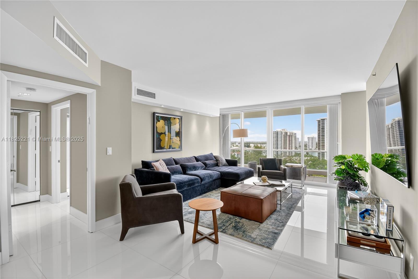 BEAUTIFULLY UPDATED 2 BEDROOM 2 BATH APARTMENT FEATURING 48¨ PORCELAIN TILES THROUGHOUT, LARGE WALK-IN CLOSET IN PRIMARY BEDROOM, STAINLESS STEEL APPLIANCES, AND AN EXTRA LARGE TERRACE, IN ONE OF WILLIAMS ISLAND´S PREMIER BUILDINGS. THE 7000 BUILDING HAS JUST BEEN COMPLETELY RENOVATED WITH A GORGEOUS NEW POOL DECK, LOBBY, HALLWAYS, COMMON ROOMS, AND A BRAND NEW GYM. WASHER & DRYER IN UNIT. LIVE IN THIS PRIVATE ISLAND WITH ACCESS TO FULL AMENITIES: 15 TENNIS COURTS, 4 PICKLEBALL COURTS, 3 RESTAURANTS, STARBUCKS, STATE OF THE ART SPA, MARINA, WALK/JOG PATH, KIDS PLAYGROUND, COURTESY BUS, WILLIAMS ISLAND SYNAGOGUE AND SO MUCH MORE.... A+ AVENTURA CHARTER SCHOOLS.