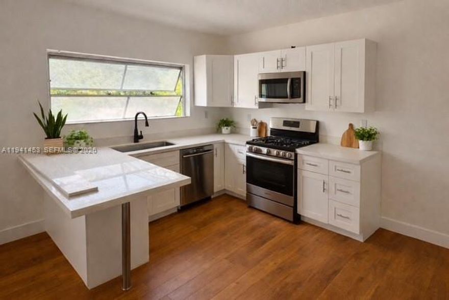 Consider it new!!!! Beautiful unit of this remodeled duplex in Little River / Little Haiti. 3 bedroom, 2 bathrooms. Stainless steel appliances. Wood floors. Blocks away from great developments. Restaurants, Coffee shops. Must see. Section 8 welcome