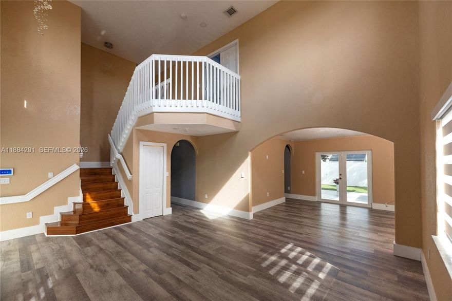 Price Improvement! Seller just adjusted the price to better align with current market conditions. Excellent opportunity in the Kendall area. Easy to show. Immaculate and beautifully maintained home with a peaceful lake view from the front of the property, located in the desirable Pelican Lake community in West Kendall. This spacious two-story residence features impact-rated windows and doors throughout, custom closets, modern zebra shades, LED lighting, and a highly efficient Titan water heater. The garage has been thoughtfully converted into a comfortable 4th bedroom or office, adding valuable living space. The main floor includes a generous kitchen and a convenient half bath. Outside, enjoy a porcelain-tiled terrace with a stylish pergola and a private fenced yard—perfect for entertaining or relaxing. Quiet, well-kept community close to top schools, parks, shopping, and dining, with quick access to major roads. Truly move-in ready.