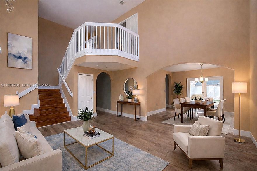 Now competitively positioned in todays market, this spacious Kendall home offers an inviting layout filled with natural light and a beautiful lake view from the front. Located in the desirable Pelican Lake community, this well maintained two story residence features impact windows and doors, custom closets, zebra shades, LED lighting, and an efficient Titan water heater. The main level includes a generous kitchen and a convenient half bath, while the outdoor space is ideal for entertaining with a porcelain tiled terrace, pergola, and private fenced yard. A versatile additional space is perfect for a home office, guest room, or playroom. Recently enhanced with new front landscaping for fresh curb appeal. Quiet community near top rated schools, parks, shopping, dining, and major roads. Move in ready and easy to show.