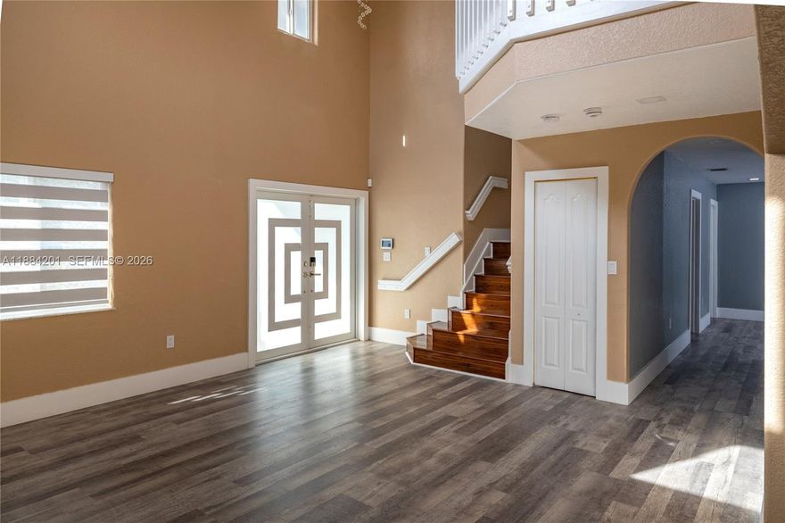 Now competitively positioned for today’s market—an excellent opportunity in the Kendall area. Easy to show. Immaculate and beautifully maintained home with a peaceful lake view from the front of the property, located in the desirable Pelican Lake community in West Kendall. This spacious two-story residence features impact-rated windows and doors throughout, custom closets, modern zebra shades, LED lighting, and a highly efficient Titan water heater. The garage has been thoughtfully converted into a comfortable 4th bedroom or office, adding valuable living space. The main floor includes a generous kitchen and a convenient half bath. Outside, enjoy a porcelain-tiled terrace with a stylish pergola and a private fenced yard—perfect for entertaining or relaxing. Quiet, well-kept community close to top schools, parks, shopping, and dining, with quick access to major roads. Truly move-in ready.