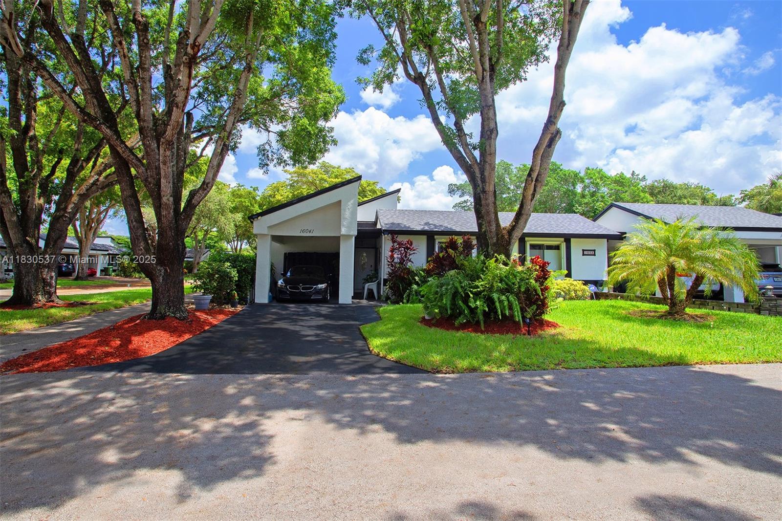 Completely remodeled corner villa in one of South Florida’s most desirable cities! Located in Weston—nationally recognized for its top-rated schools, family-friendly environment, and exceptional quality of life—this 3-bedroom, 2-bath home offers the perfect blend of comfort and style. Enjoy an open-concept layout, elegant crown molding, accordion shutters, and two private interior terraces. The screened patio with acrylic windows provides year-round enjoyment. Roof replaced in Nov 2024 and exterior painted in June 2025. Bright, spacious, and move-in ready—your ideal Weston lifestyle starts here! Live where others vacation—safe, beautiful, and just minutes from parks, golf, and major highways. Home to top-rated public and private schools.