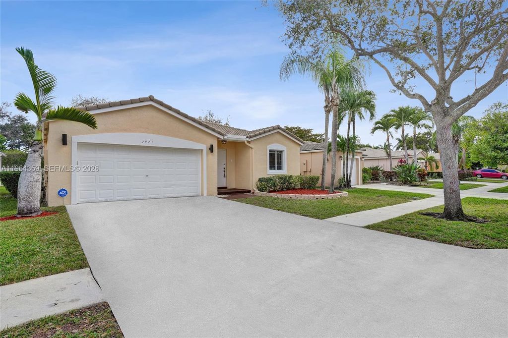 Photo of 2421 SW 103rd Way, Miramar, FL 33025 (MLS # A11964359)
