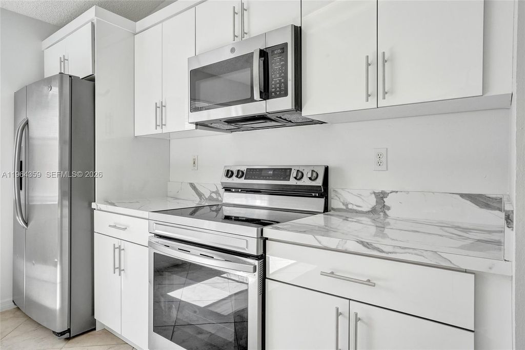 Photo of 2421 SW 103rd Way, Miramar, FL 33025 (MLS # A11964359)