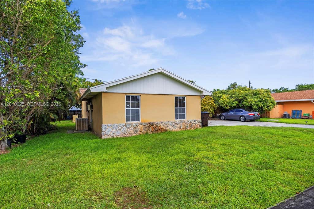 Photo of 1831 Hiltonia Cir, West Palm Beach, FL 33407 (MLS # A12010625)