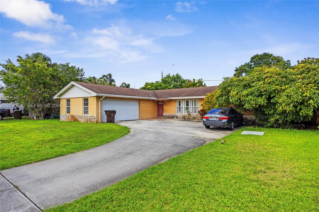 Photo of 1831 Hiltonia Cir, West Palm Beach, FL 33407 (MLS # A12010625)